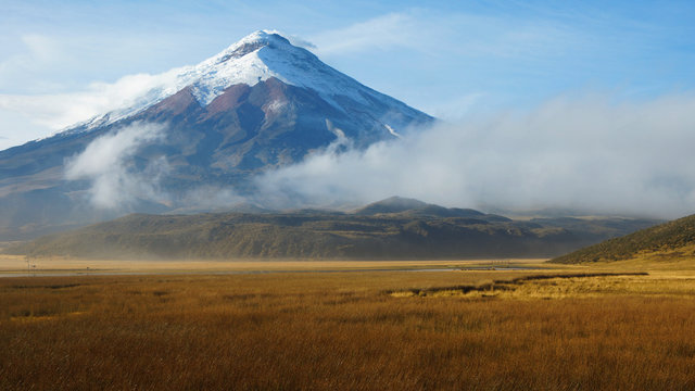 View of Limpiopungo lagoon with volcano Cotopaxi in the background on a cloudy morning - Ecuador