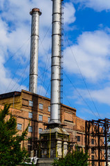 Chimney of the old power plant in a city Kremenchug, Ukraine