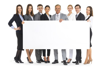 Business people holding a banner