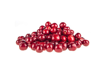 Many berries of fresh cherries on the white background