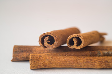 Cinnamon stick on white