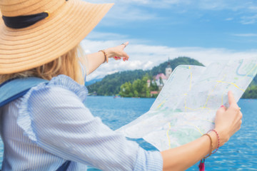 Fototapeta premium Tourist with a map enjoying the summertime.