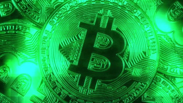 Crypto currency Gold Bitcoin - BTC - Bit Coin. Macro shots crypto currency Bitcoin coins rotating. Holomatrix style. Seamless looping.