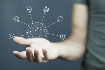 Hands holding circle global network connection in screen