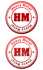 Pair of red rubber stamps in grunge and solid style with caption Heavy Metal and abbreviation HM