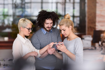 group of Business People Working With Tablet in startup office