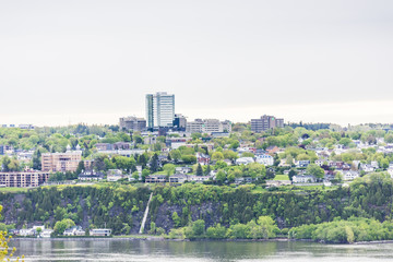 Obraz premium Cityscape or skyline of Levis town from plaines d'Abraham in summer in Quebec City, Canada overlooking the Saint Lawrence river