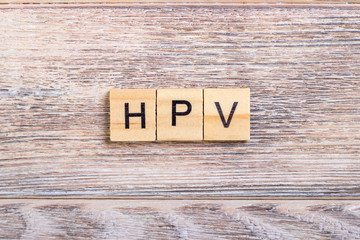 HPV Human Papillomavirus acronym on wooden cubes