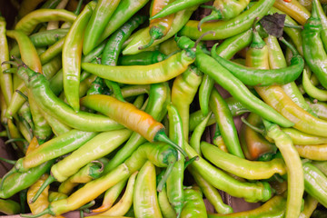 Green bitter pepper background top view Many green chili peppers, Food raw material