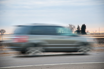 Fast vehichle rushing though the countryside