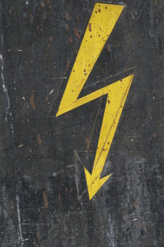 Yellow flash electricity sign