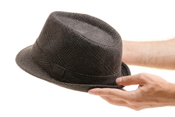 Hat in male hands isolated