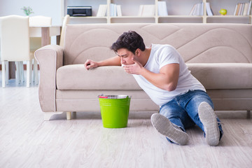 Man suffering from sick stomach and vomiting