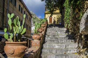 Fototapeta premium Detail street with stairs in the city of taormina