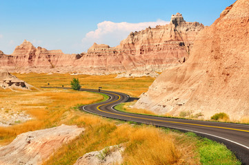 Scenic road across Badlands National Park, South Dakota, USA - obrazy, fototapety, plakaty