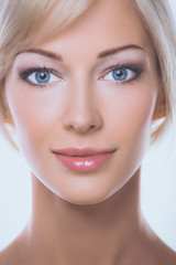 Close up portrait of beautiful young woman face