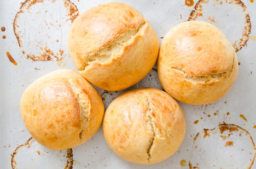 Buns on baking tray ready for eating.Homemade bakery at home