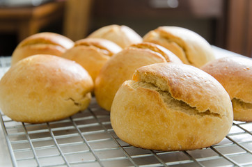Buns on cooking rack ready for eating.Homemade bakery at home