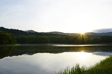 Landscapes of mountains and lake with sunrise in the morning