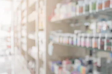 Papier Peint photo Pharmacie Arrière-plan flou de pharmacie avec des médicaments sur des étagères