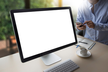Fototapeta premium young man working Businessman using a desktop computer of the blank screen