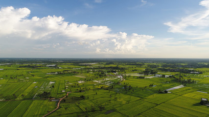 Fototapeta na wymiar Aerial view over small village, Country roadside.