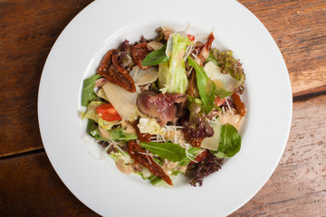 Salad with roast beef and tomatoes. Top view.