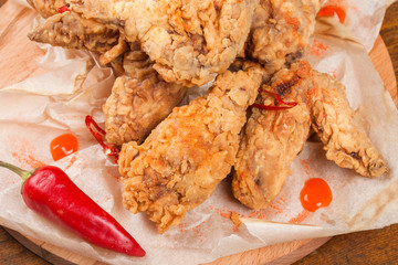 Spicy chicken wings in batter. Snacks for beer.  Top view.