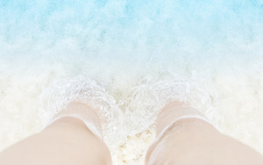 Feet in the sea waters