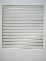White dirty plastic louver with border