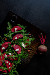 beetroot salad, with goat cheese, hazelnut and rocket leaves..