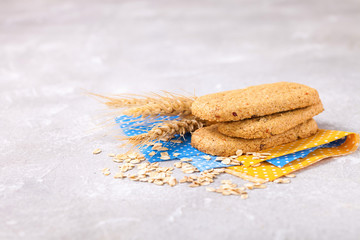 Dietary bars from porridge on a gray concrete background. Selective focus. Copy space