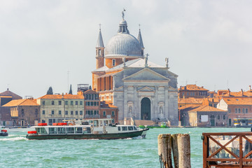 Naklejka premium A view of the island of Giudecca, located opposite mail island Venice. Church of Redentore- San Giorgio Maggiore (Chiesa di San Giorgio Maggiore).Italy.