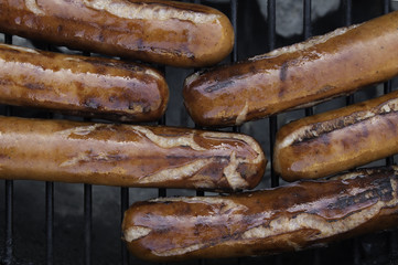 Hotdogs on the grill.