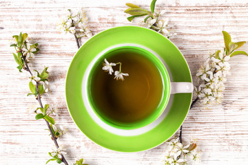 Tea and flowers of cherry