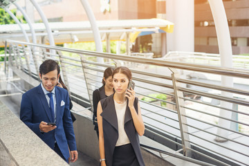 Portrait Of Team Business people worker talk on phone, Team Outside.