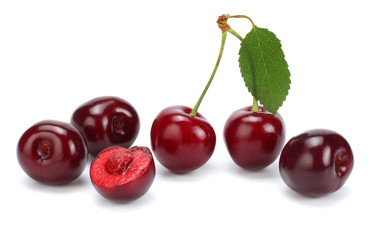 cherries with green leaf isolated on white background.