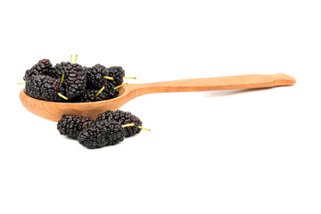 Black mulberry in spoon