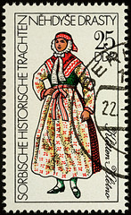 Woman in Sorbian traditional dress on postage stamp
