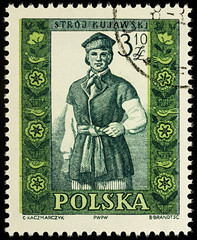 Man in traditional Polish costume on postage stamp