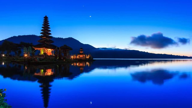 Pura Ulun Danu Bratan Temple On Water, Bali Landmark Travel Place Of Indonesia 4K Night to Day Time lapse (zoom out)