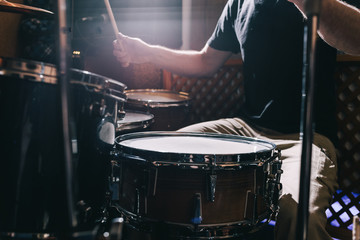 Professional drum set closeup. Drummer plays drums, live music concert