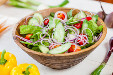 vegetable salad bowl on kitchen table, balanced diet
