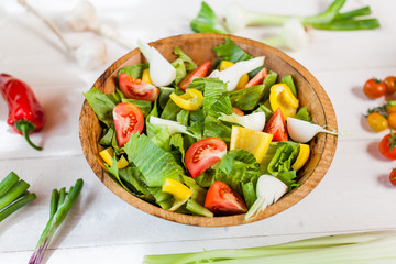 vegetable salad bowl on kitchen table, balanced diet