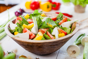 vegetable salad bowl on kitchen table, balanced diet