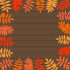 Vector frame of autumn leaves on wooden background.