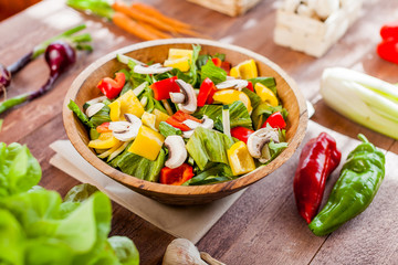 vegetable salad bowl on kitchen table, balanced diet