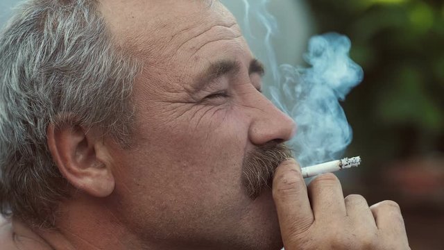 Smoking Rural Man with Mustaches