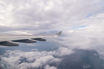 Fototapeta na wymiar Aerial view of cloud blue sky View from airplane window