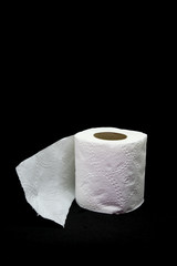 Roll Of Toilet Paper on black Background.